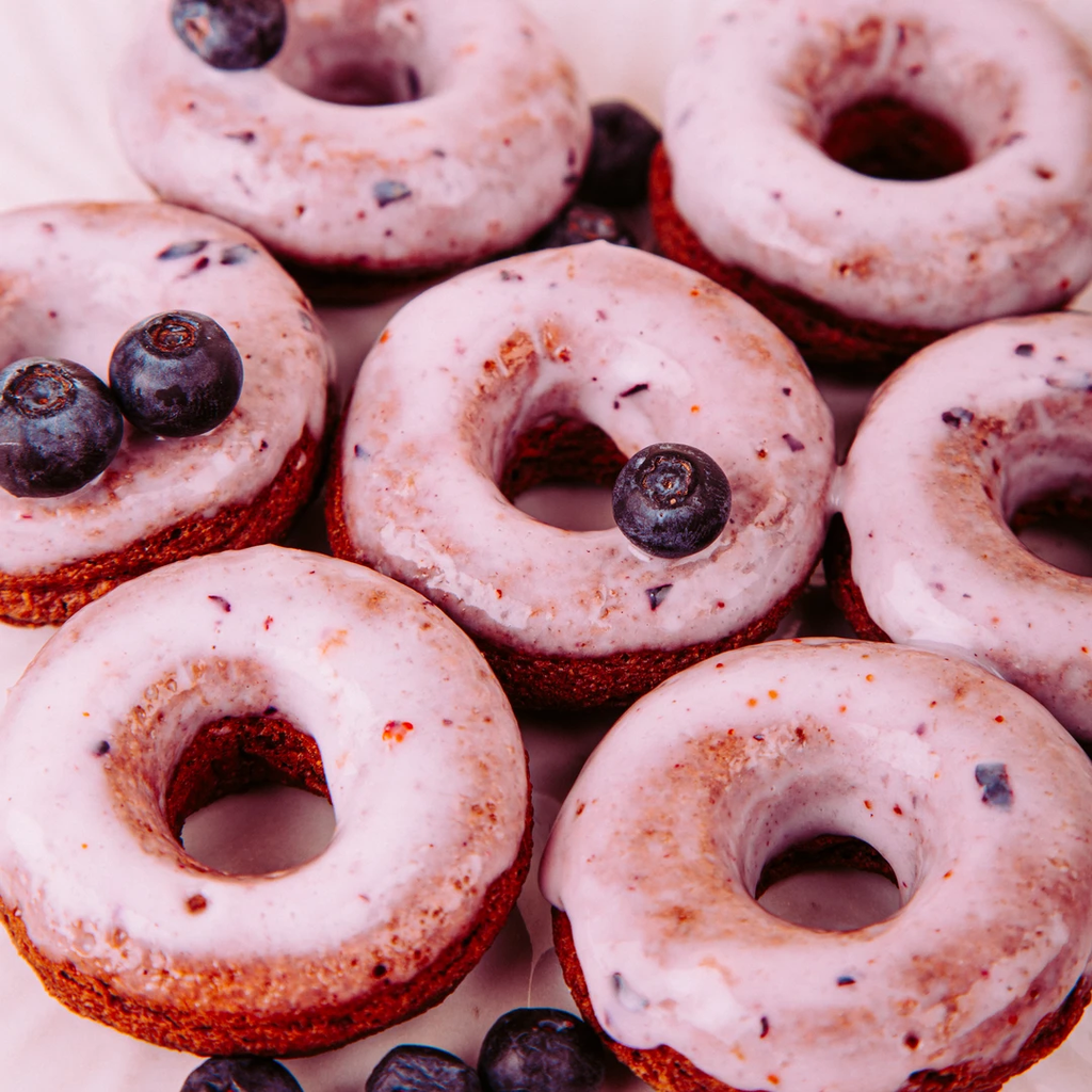 Oven-baked donuts with blueberry glaze