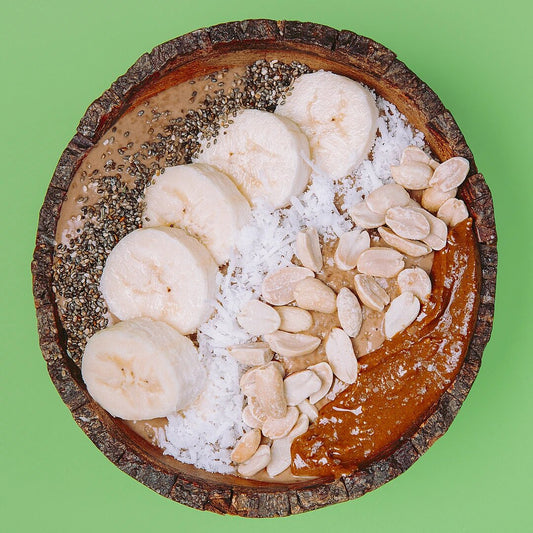 Banana smoothie bowl with cocoa peanut butter